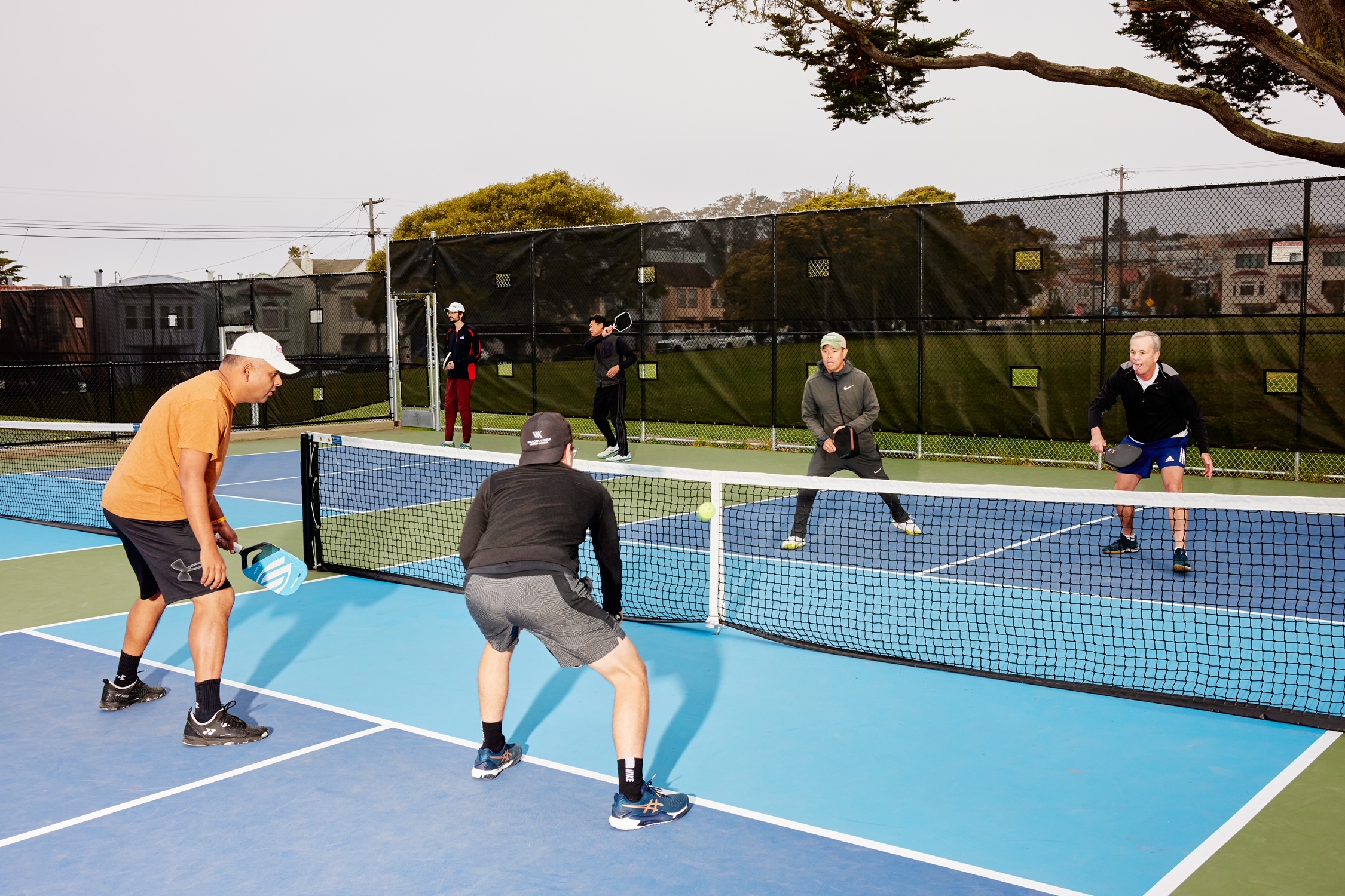 To Be A Great Athlete Is Prohibitively Expensive For Most - Sam Dogen, Financial Samurai playing pickleball with friends